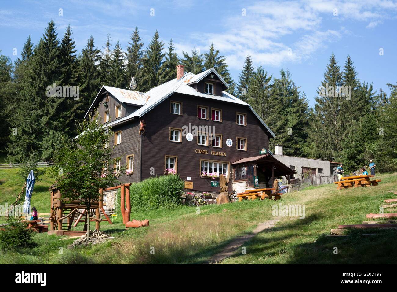 Skalka, Beskid mountains, Czech Republic / Czechia - August 16, 2020: Mountain cabin, hut and cottage in the nature. Wood and forest with trees are ar Stock Photo