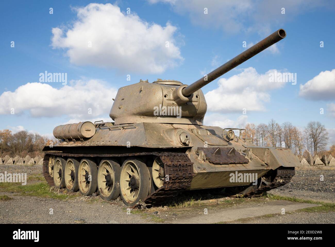 Old aged soviet tank from second world war - armored fighting vehicle with continuous track and cannon. Stock Photo