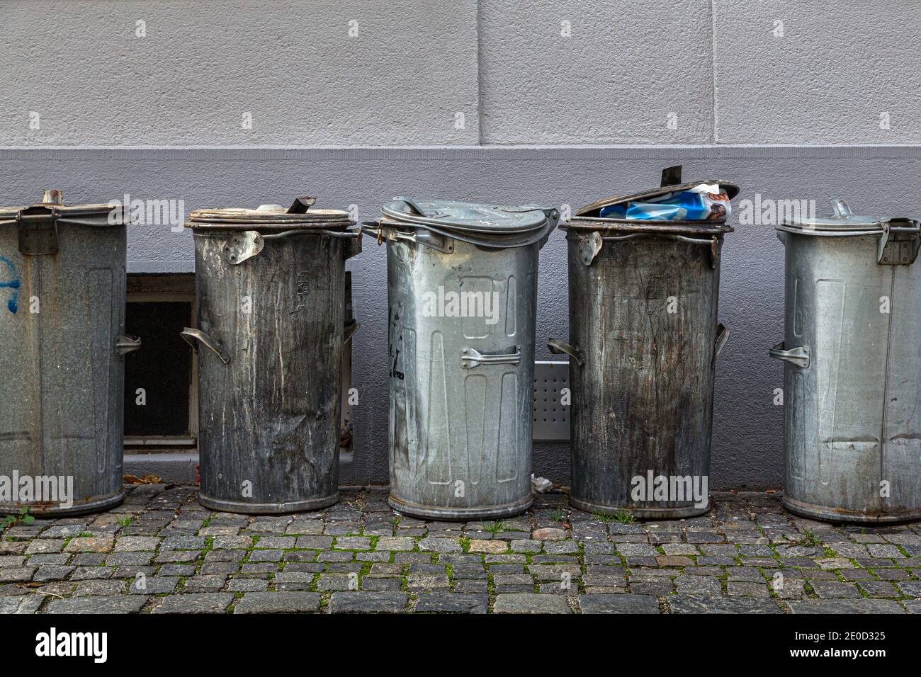 Trash cans in an alley hires stock photography and images Alamy