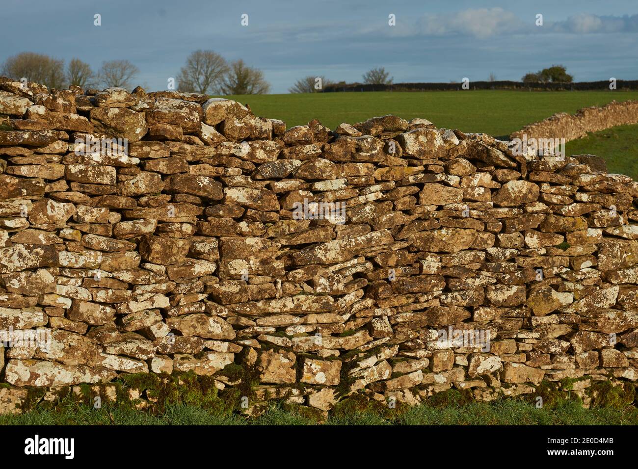 Dry stone walls marking field boundaries in the Woolley Valley, an Area of Outstanding Natural Beauty in the Cotswolds on the outskirts of Bath, UK Stock Photo
