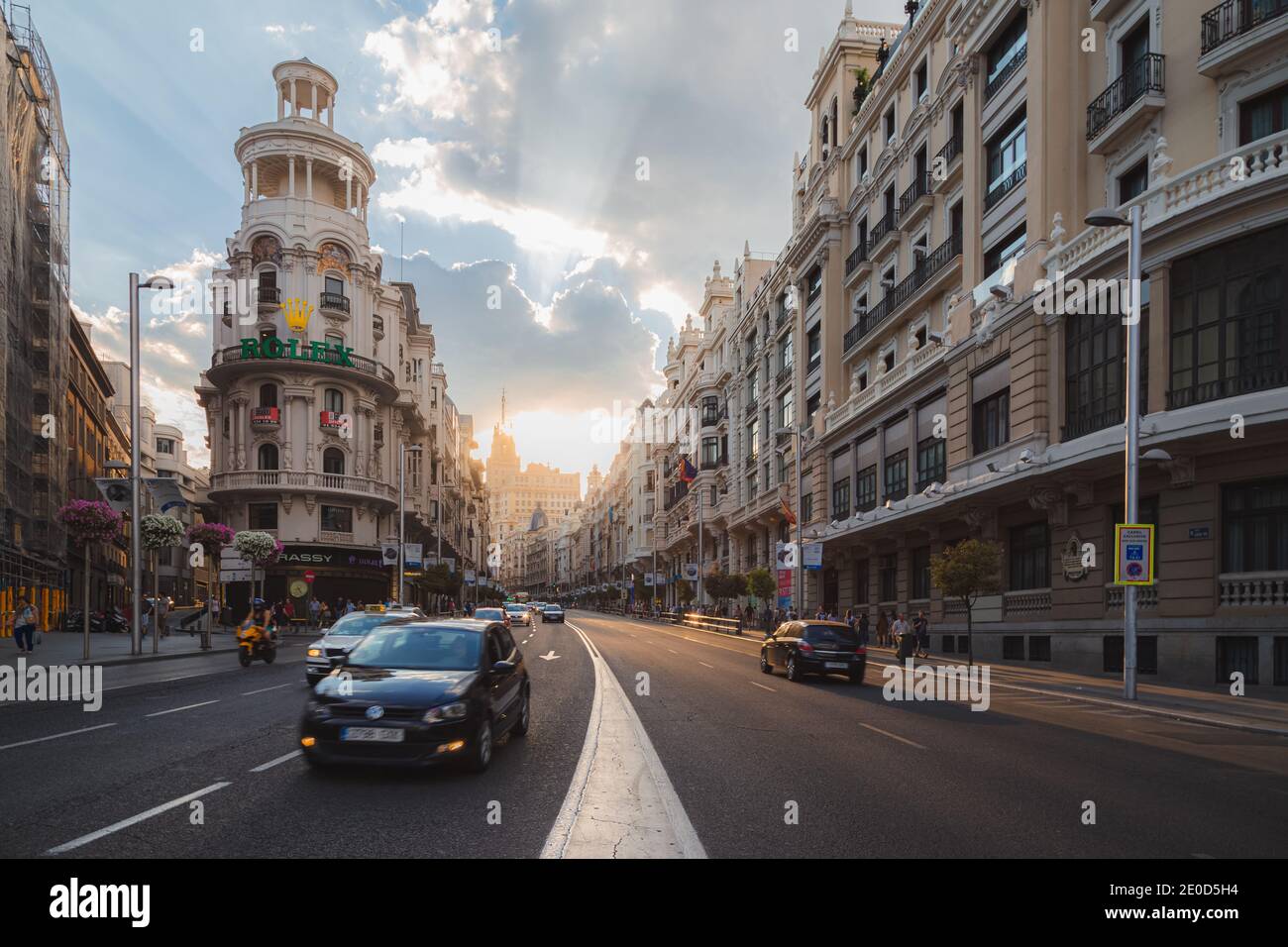 Madrid, Spain - June 7 2015: Evening traffic along the busy shopping street of Gran Via in the Spanish capital Madrid. Stock Photo