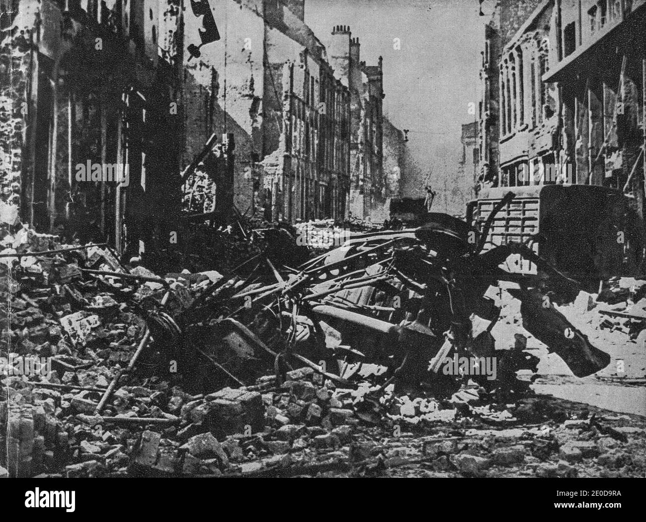 FRANCE - 1940s: Unknown destroyed street and town on north France. Reproduction from fascist magazine. Nazi propaganda. Stock Photo