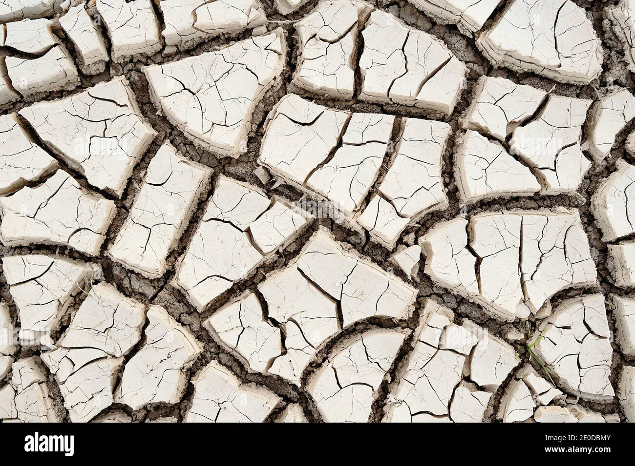 Top view closeup textured background of rough cracked barren waterless ...