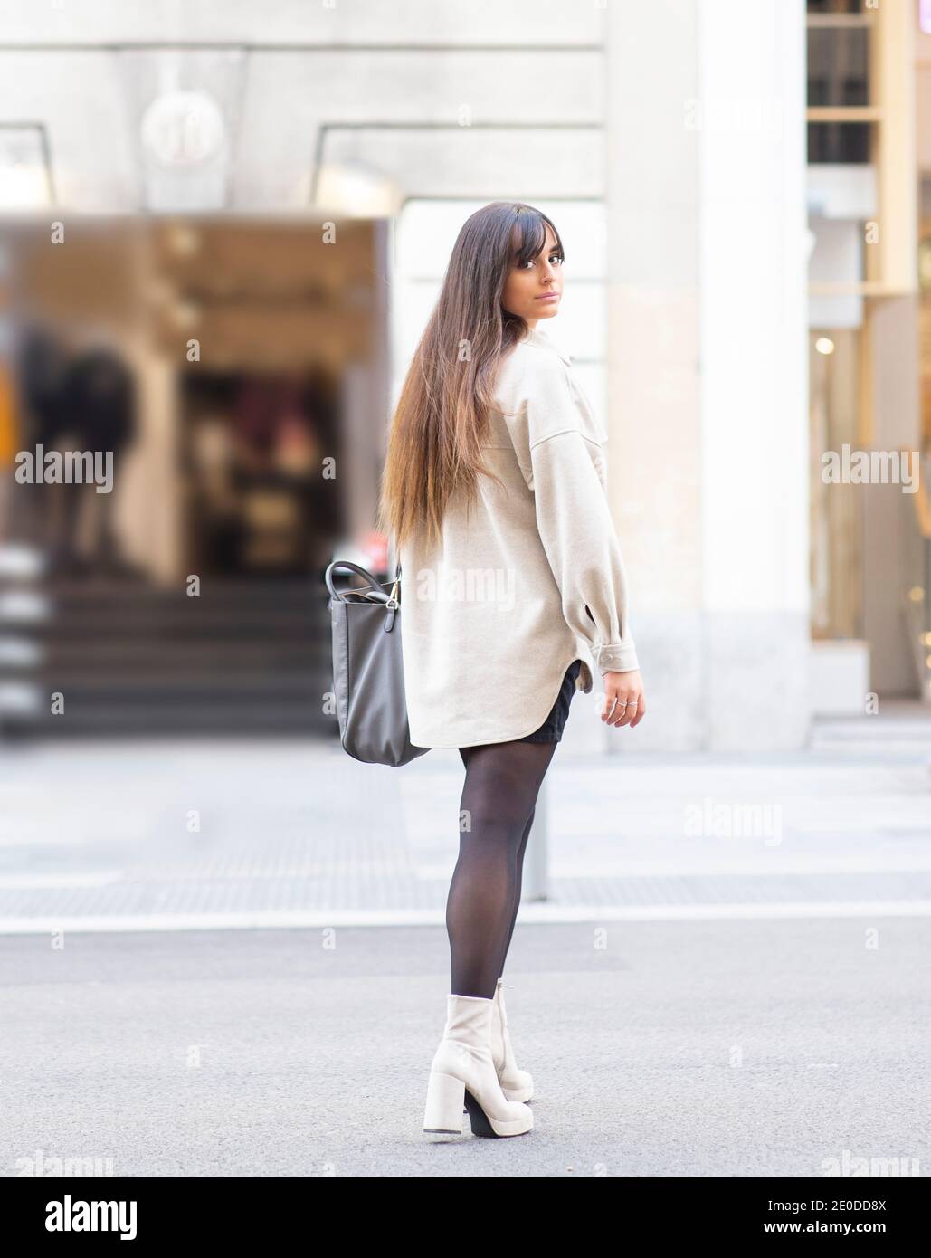 Woman back over shoulder dark hi-res stock photography and images - Alamy