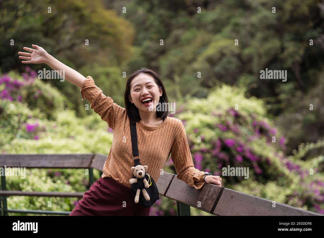 Asian female tourist standing hi-res stock photography and images - Alamy