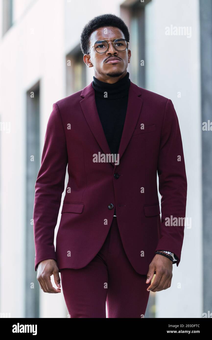 Stylish young businessman in suit on city street hi-res stock ...