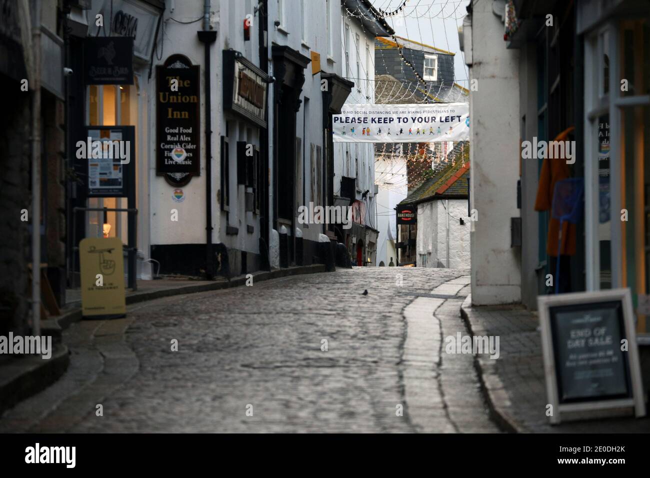 High Street is pictured empty during New Year's Eve amid the coronavirus disease (COVID-19) outbreak, in St Ives, Cornwall, Britain December 31, 2020. REUTERS/Tom Nicholson Stock Photo