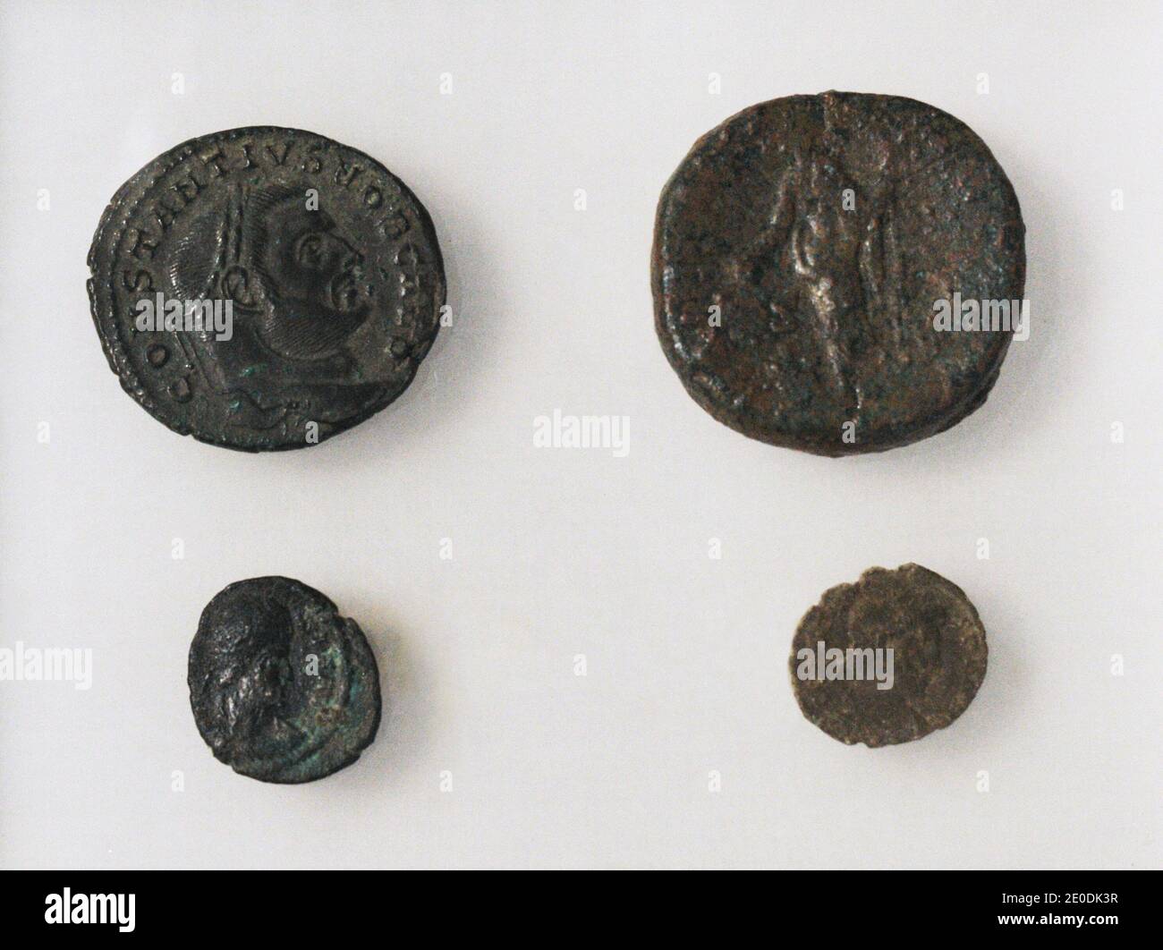 Roman coins (83-348 AD). From the Tower of Hércules, La Coruña, Galicia, Spain. Archaeological and History Museum (San Anton Castle). A Coruña, Galicia, Spain. Stock Photo