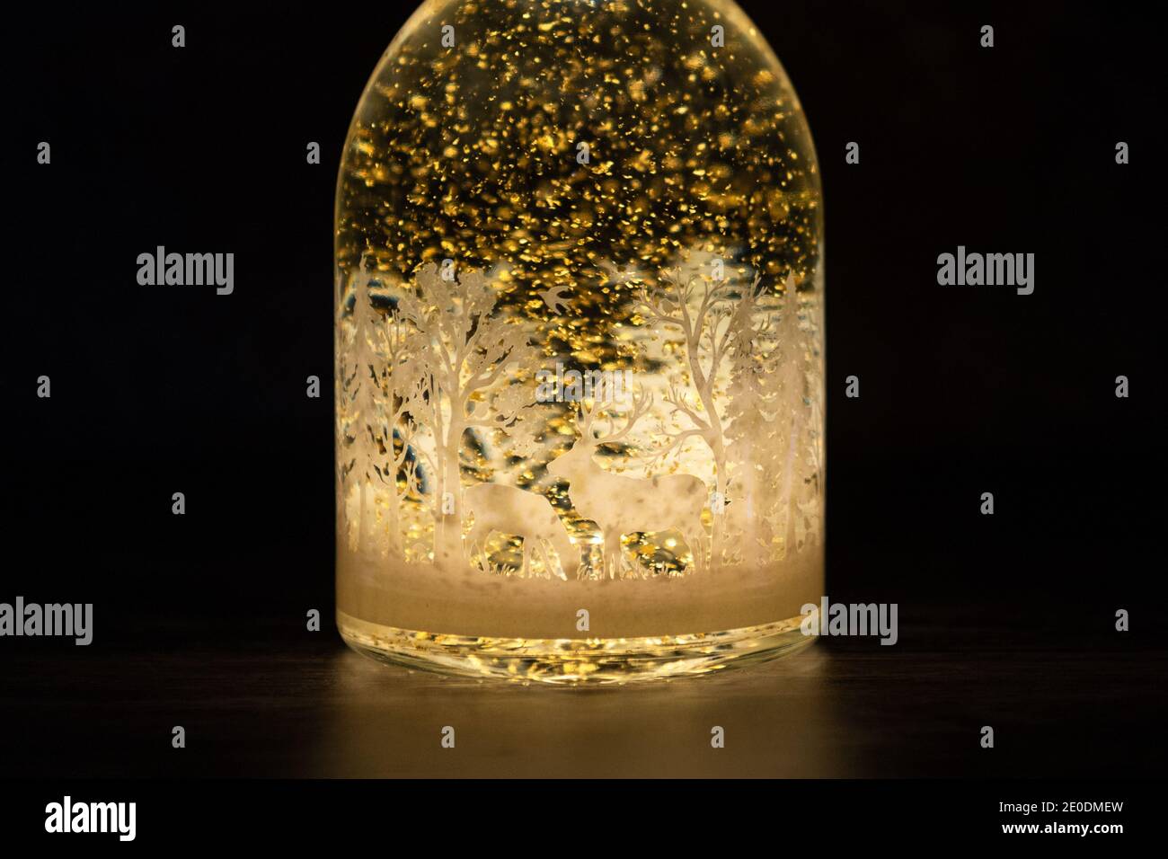 Marks and Spencer christmas clementine gin liqueur light up snow globe with edible gold leaf Stock Photo