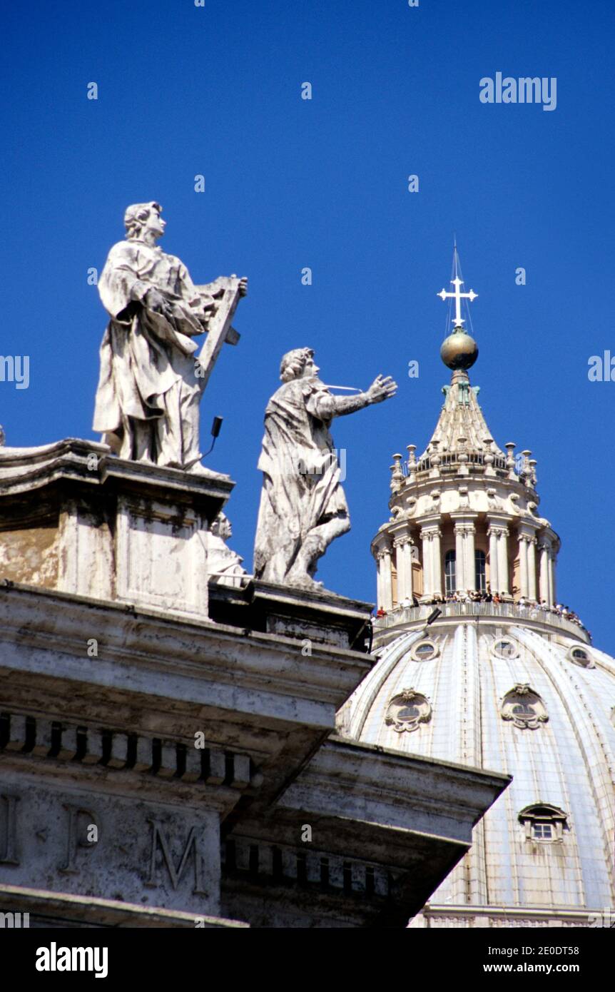 Statues on Bernini's colonnade, and dome, at St. Peter's Square, St