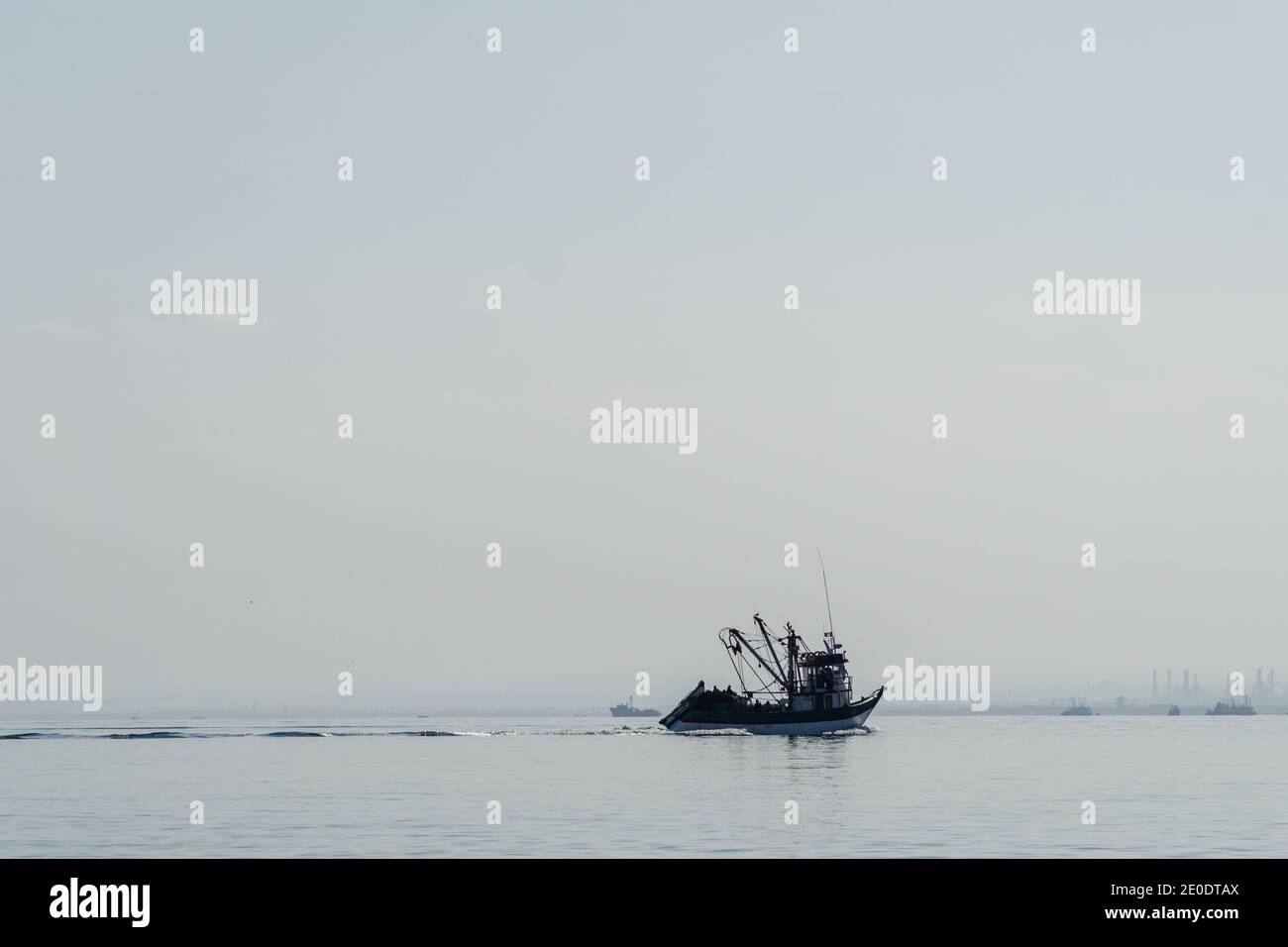 Fishing Boat Far Off the Coast of Peru. Stock Photo