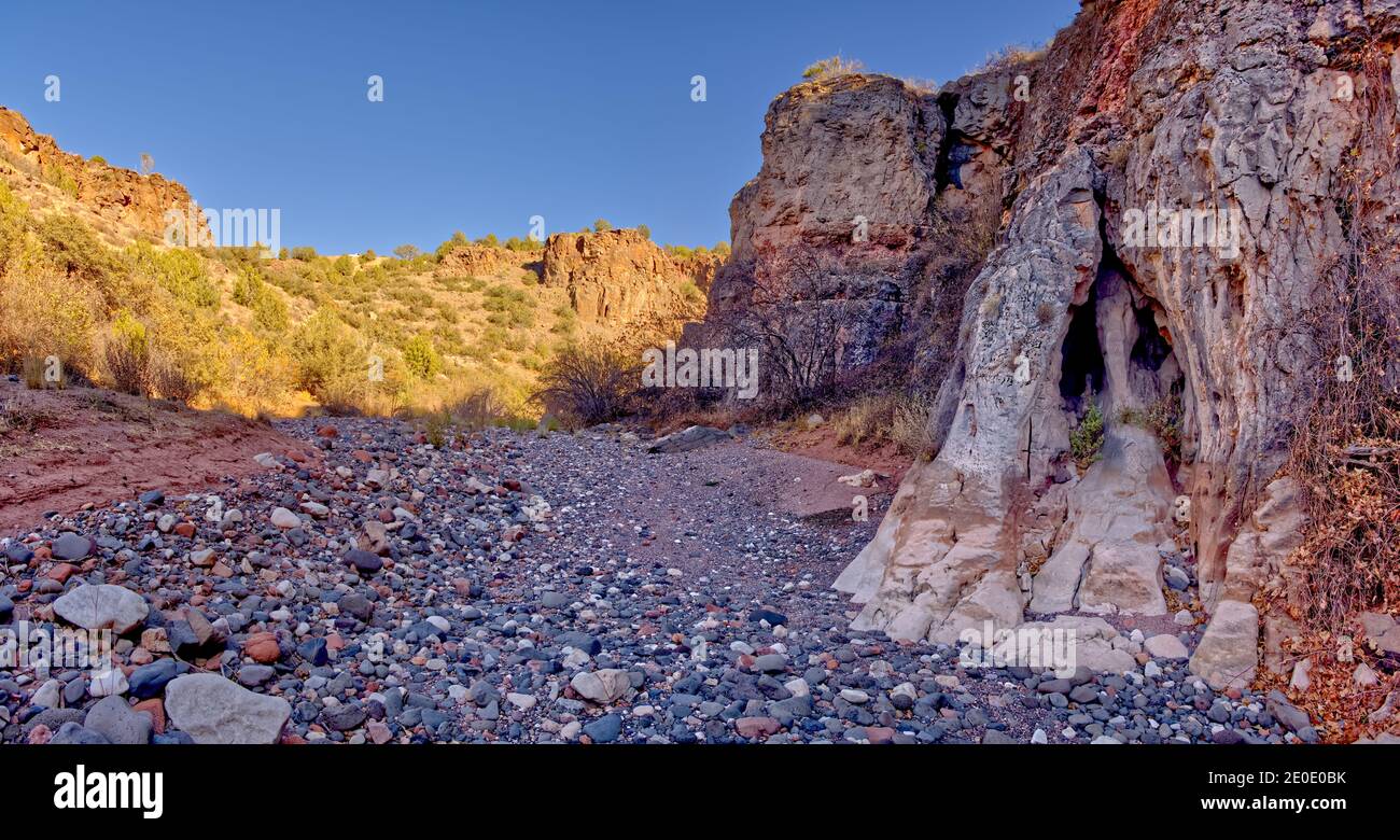 A portallike cave formation on the right in the bottom of Hell Canyon