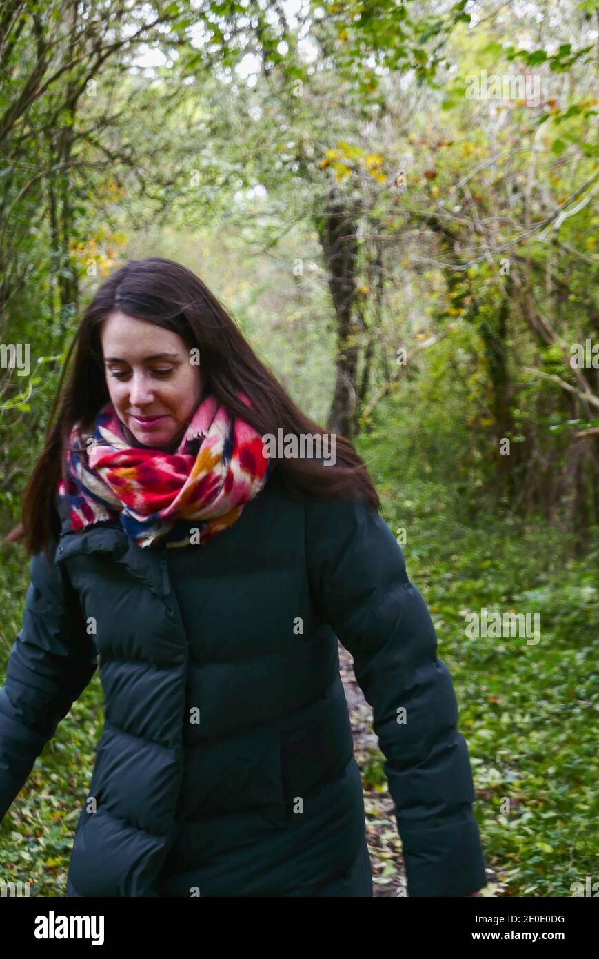 Young woman walks through forest hi-res stock photography and images ...