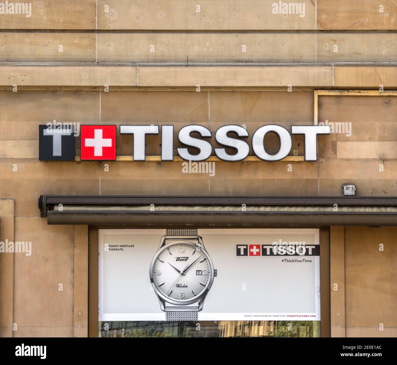 Tissot logo on their jewelry boutique in Basel. Tissot is a Swiss luxury watchmaker famous for chronographs and watches. Stock Photo