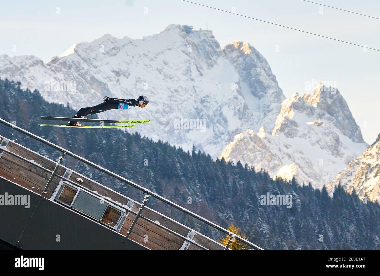 Andreas WELLINGER, GER in action in front of Zugspitze mountain at the Four Hills Tournament Ski Jumping at Olympic Stadium, Grosse Olympiaschanze in Garmisch-Partenkirchen, Bavaria, Germany, December 31, 2020.  © Peter Schatz / Alamy Live News Stock Photo