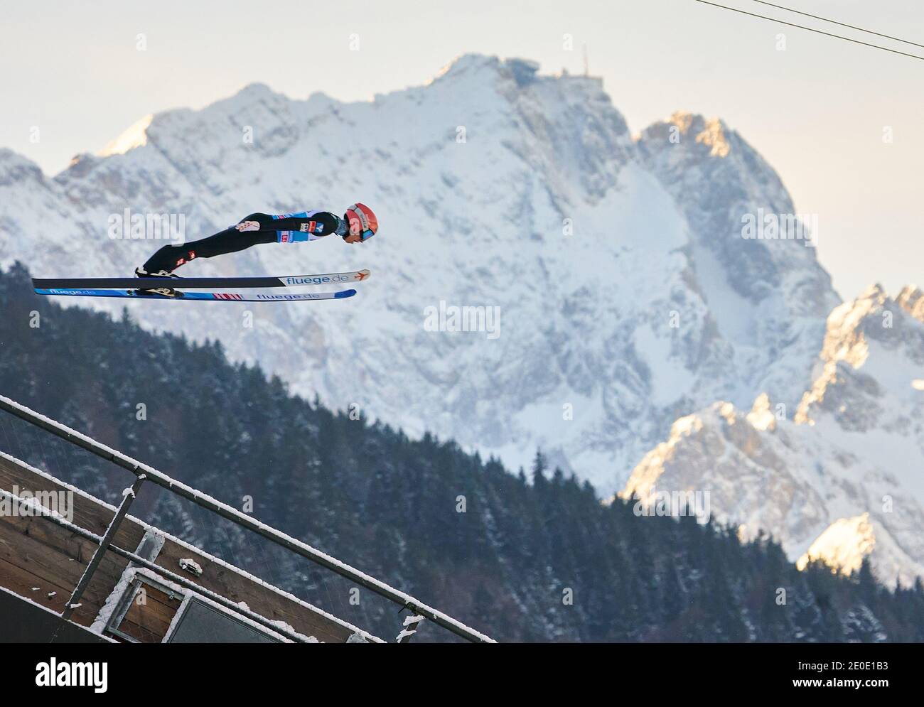 Jan HOERL, AUT in action in front of Zugspitze mountain at the Four Hills Tournament Ski Jumping at Olympic Stadium, Grosse Olympiaschanze in Garmisch-Partenkirchen, Bavaria, Germany, December 31, 2020.  © Peter Schatz / Alamy Live News Stock Photo