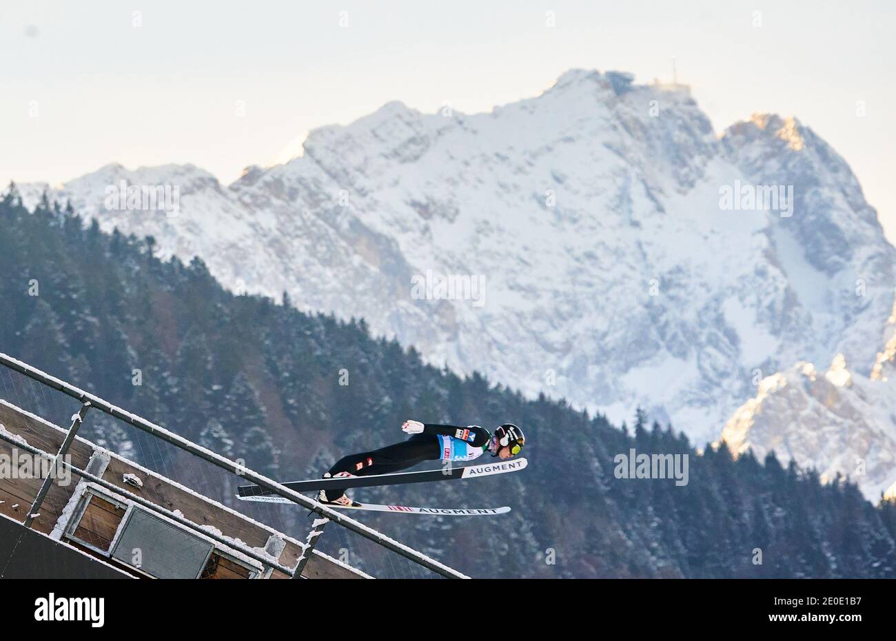 Markus SCHIFFNER, AUT in action in front of Zugspitze mountain at the Four Hills Tournament Ski Jumping at Olympic Stadium, Grosse Olympiaschanze in Garmisch-Partenkirchen, Bavaria, Germany, December 31, 2020.  © Peter Schatz / Alamy Live News Stock Photo