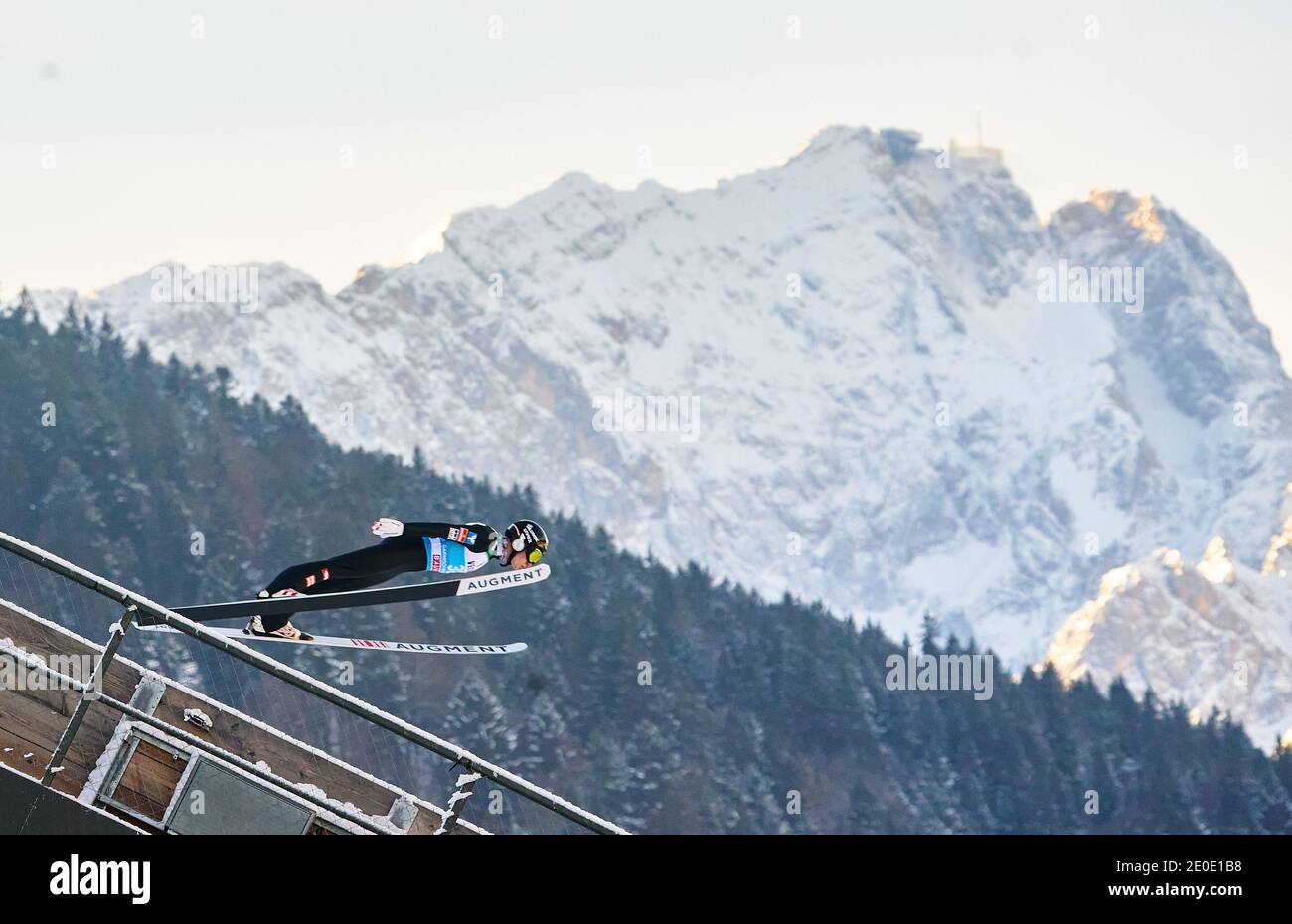 Markus SCHIFFNER, AUT in action in front of Zugspitze mountain at the Four Hills Tournament Ski Jumping at Olympic Stadium, Grosse Olympiaschanze in Garmisch-Partenkirchen, Bavaria, Germany, December 31, 2020.  © Peter Schatz / Alamy Live News Stock Photo