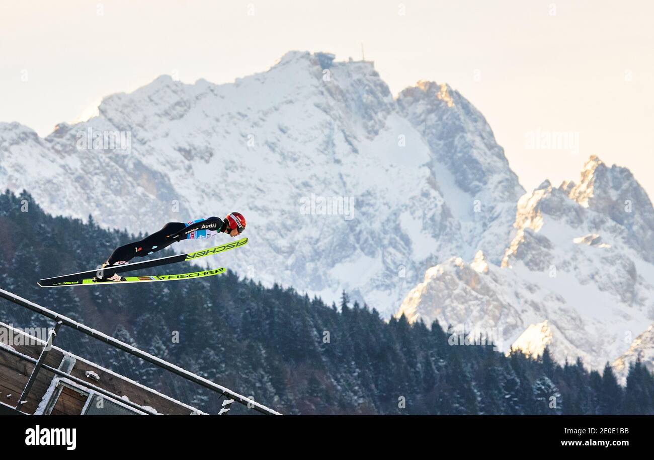 In front of Zugspitze mountain: Constantin SCHMID, GER in action at the Four Hills Tournament Ski Jumping at Olympic Stadium, Grosse Olympiaschanze in Garmisch-Partenkirchen, Bavaria, Germany, December 31, 2020.  © Peter Schatz / Alamy Live News Stock Photo