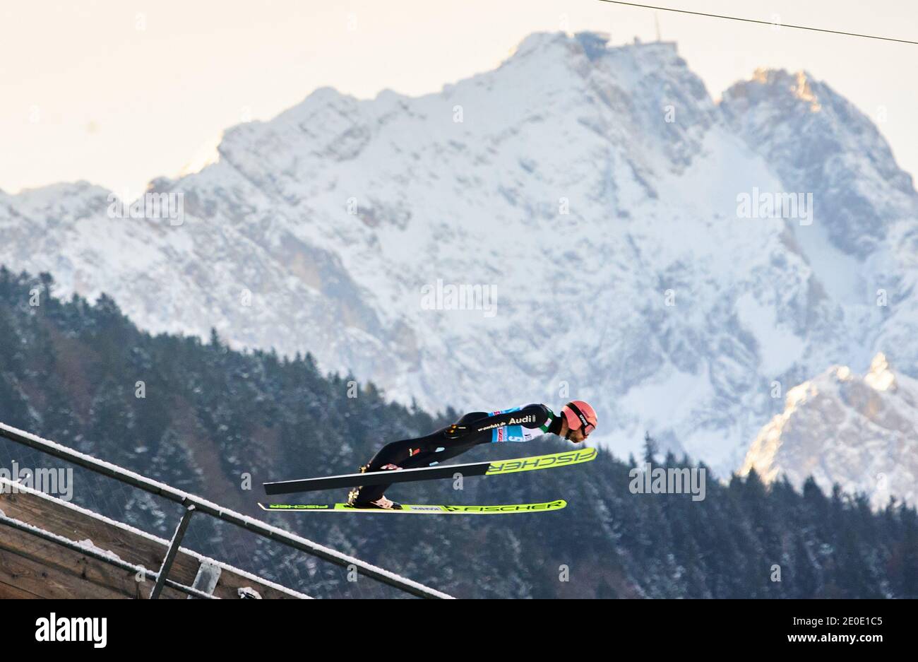 In front of Zugspitze mountain: Pius PASCHKE, GER in action at the Four Hills Tournament Ski Jumping at Olympic Stadium, Grosse Olympiaschanze in Garmisch-Partenkirchen, Bavaria, Germany, December 31, 2020.  © Peter Schatz / Alamy Live News Stock Photo