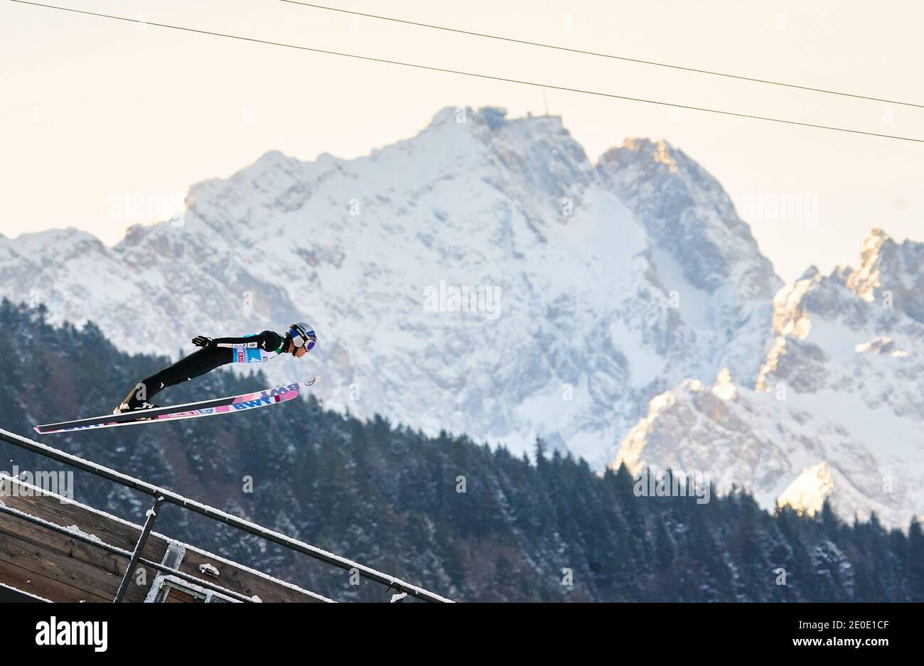 In front of Zugspitze mountain: Keiichi SATO, JPN in action at the Four Hills Tournament Ski Jumping at Olympic Stadium, Grosse Olympiaschanze in Garmisch-Partenkirchen, Bavaria, Germany, December 31, 2020.  © Peter Schatz / Alamy Live News Stock Photo