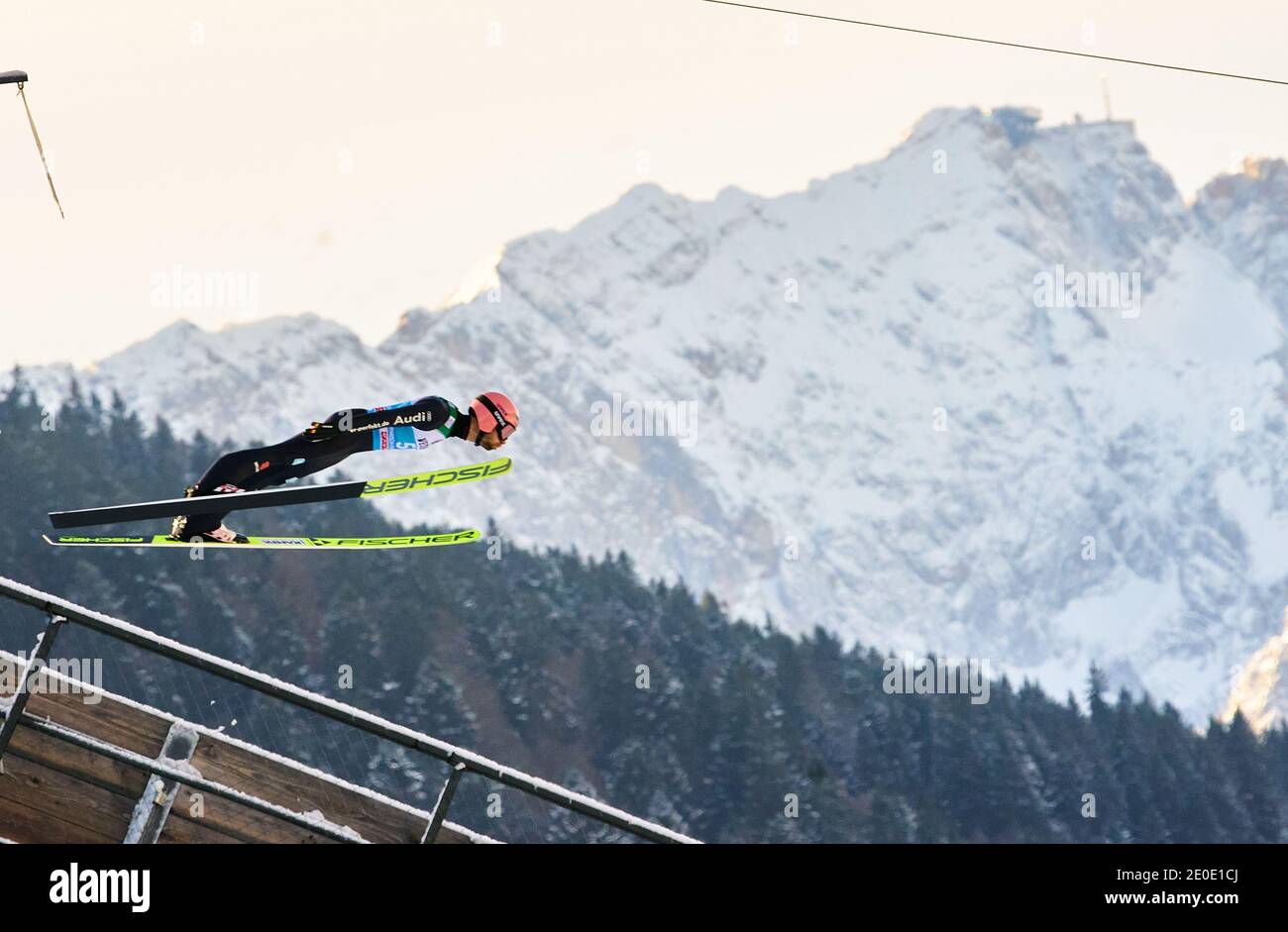 In front of Zugspitze mountain: Pius PASCHKE, GER in action at the Four Hills Tournament Ski Jumping at Olympic Stadium, Grosse Olympiaschanze in Garmisch-Partenkirchen, Bavaria, Germany, December 31, 2020.  © Peter Schatz / Alamy Live News Stock Photo