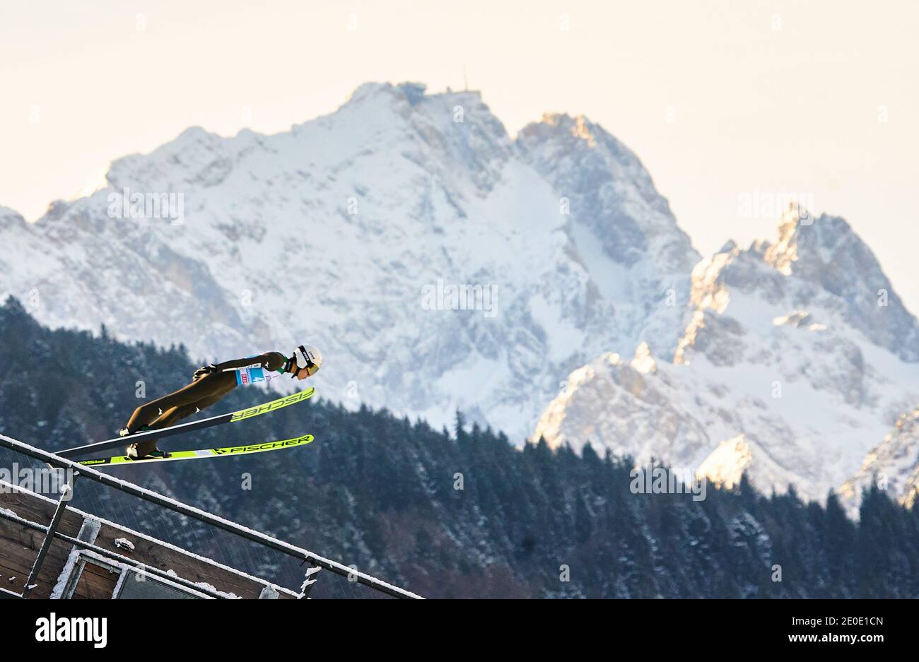 In front of Zugspitze mountain: Keiichi SATO, JPN in action at the Four Hills Tournament Ski Jumping at Olympic Stadium, Grosse Olympiaschanze in Garmisch-Partenkirchen, Bavaria, Germany, December 31, 2020.  © Peter Schatz / Alamy Live News Stock Photo