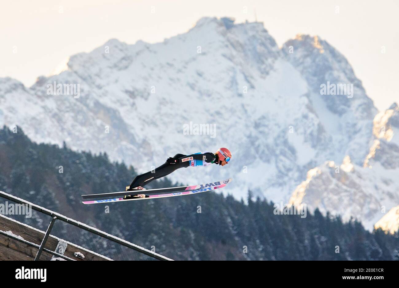 Dawid KUBACKI, POL in action in front of Zugspitze mountain at the Four Hills Tournament Ski Jumping at Olympic Stadium, Grosse Olympiaschanze in Garmisch-Partenkirchen, Bavaria, Germany, December 31, 2020.  © Peter Schatz / Alamy Live News Stock Photo