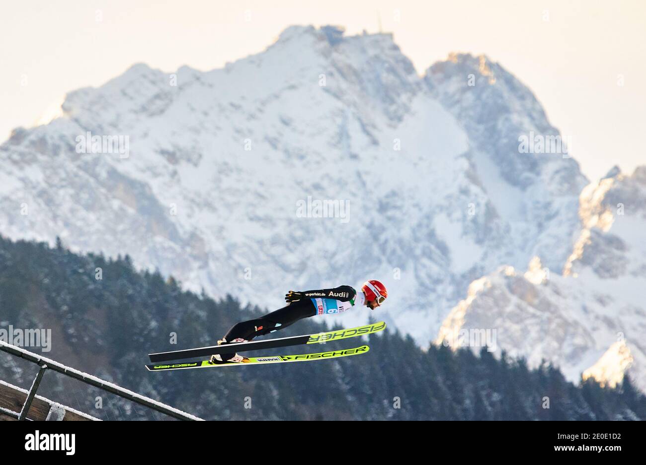 Markus EISENBICHLER, GER  in action in front of Zugspitze mountain at the Four Hills Tournament Ski Jumping at Olympic Stadium, Grosse Olympiaschanze in Garmisch-Partenkirchen, Bavaria, Germany, December 31, 2020.  © Peter Schatz / Alamy Live News Stock Photo
