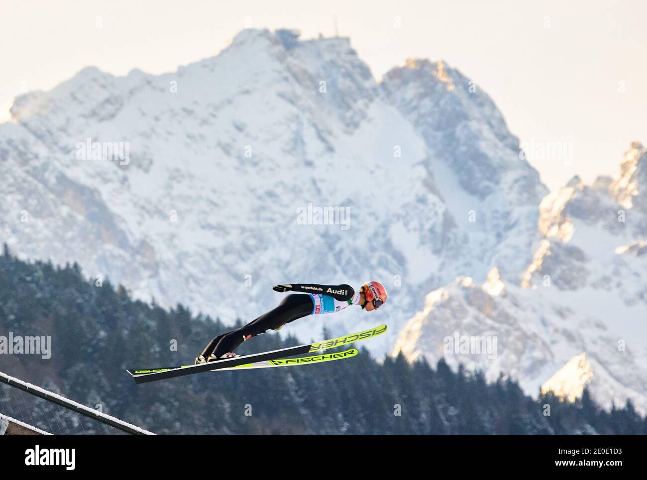 Karl GEIGER, GER  in action in front of Zugspitze mountain at the Four Hills Tournament Ski Jumping at Olympic Stadium, Grosse Olympiaschanze in Garmisch-Partenkirchen, Bavaria, Germany, December 31, 2020.  © Peter Schatz / Alamy Live News Stock Photo