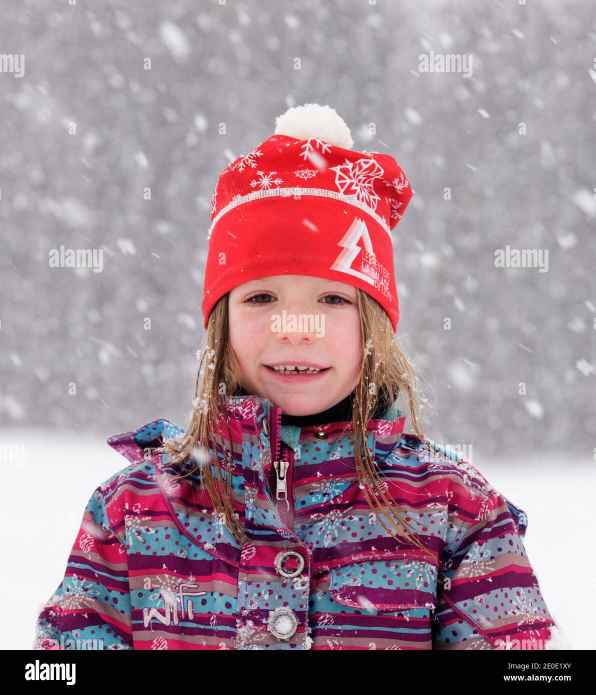 Girl smiling in snow hires stock photography and images Alamy