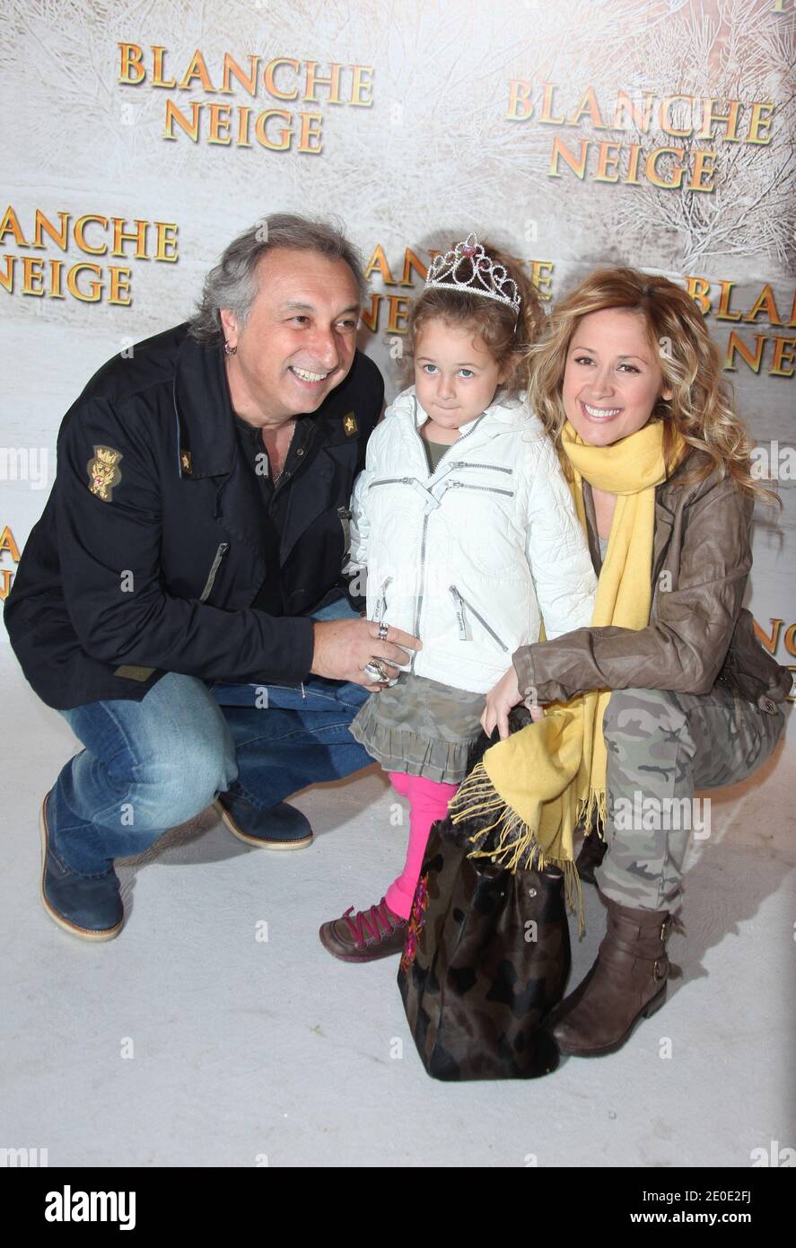 Lara Fabian, Gerard Pullicino and their daughter Lou attend the French  Premiere of the movie 'Blanche Neige' (original title : Mirror Mirror) held  at the Gaumont Capucines Cinema on April 1, 2012