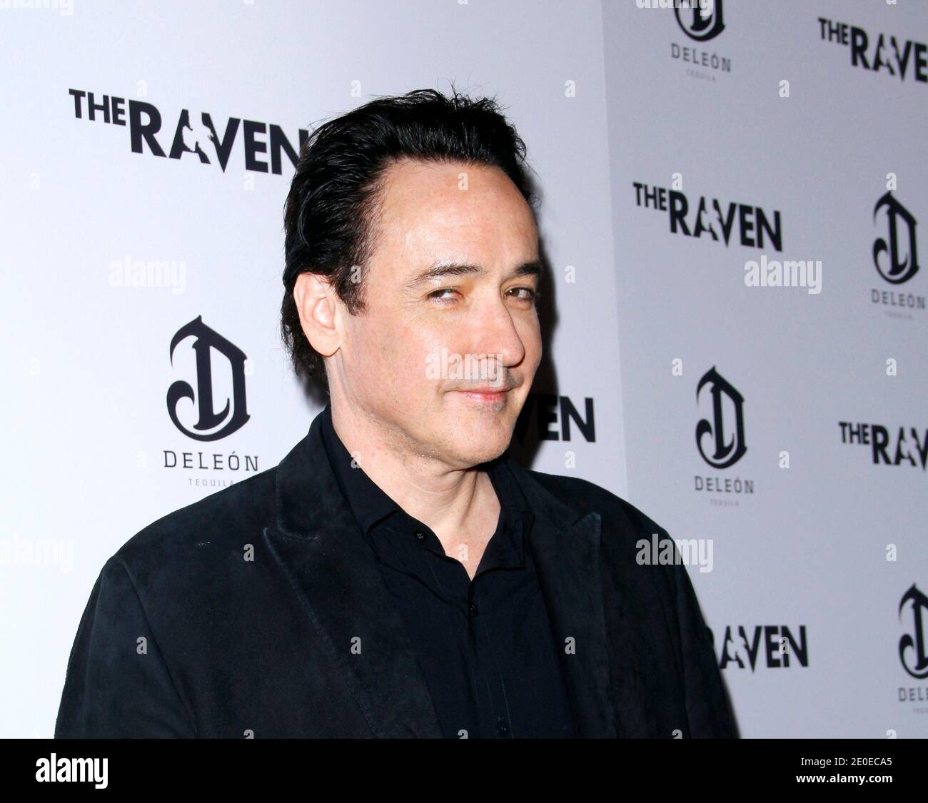 John Cusack arriving for the screening of The Raven, at the Sunshine Landmark Theater in New York City, NY, USA on April 16, 2012. The film stars John Cusack as Edgar Allan Poe, and Alice Eve as Poe's love interest. Photo by Donna Ward/ABACAPRESS.COM Stock Photo