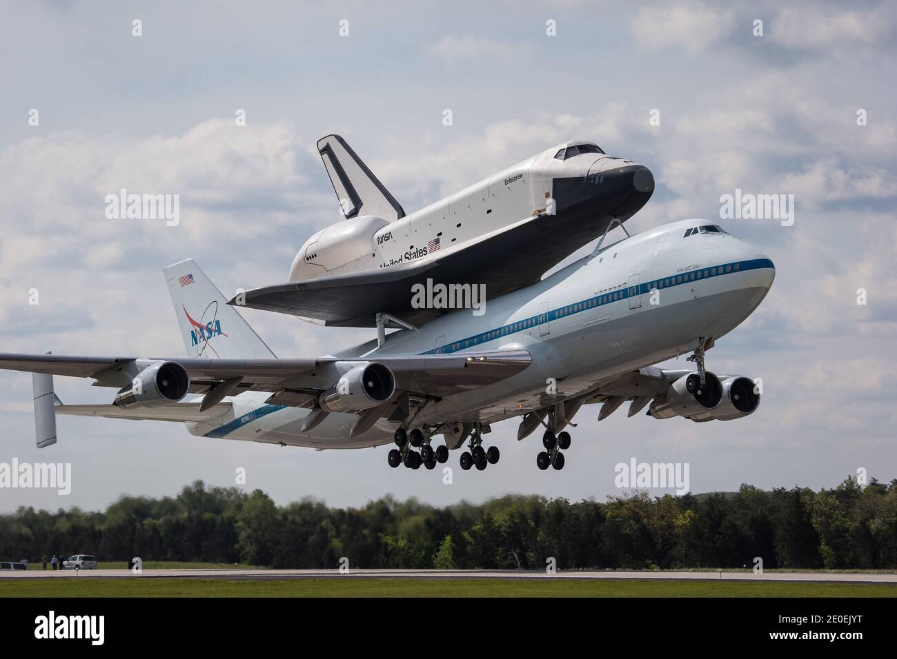 Space shuttle Enterprise, mounted atop a NASA 747 Shuttle Carrier Aircraft (SCA), is seen as it takes off for New York from Washington Dulles International Airport, Friday, April 27, 2012, in Sterling, VA. Enterprise was the first shuttle orbiter built for NASA performing test flights in the atmosphere and was incapable of spaceflight. Originally housed at the Smithsonian's Steven F. Udvar-Hazy Center, Enterprise will be demated from the SCA and placed on a barge that will eventually be moved by tugboat up the Hudson River to the Intrepid Sea, Air & Space Museum in June. Photo by Scott Andrews Stock Photo