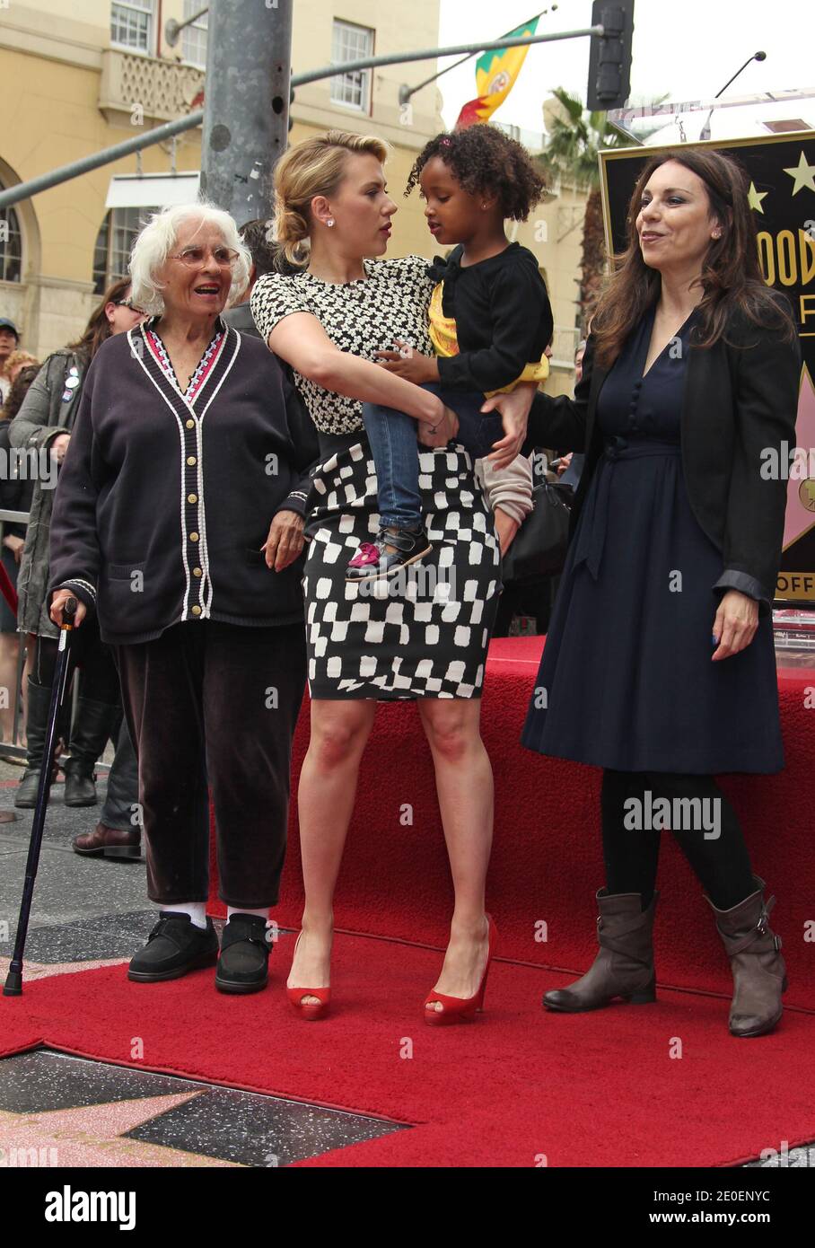 Actress Scarlett Johansson of 'Marvel's The Avengers' (C) poses with her grandmother Dorothy Sloan (L) her mother Melanie Sloan (R) and sister Fenan Sloan during an unveiling ceremony honoring her with the 2,470th star on the Hollywood Walk of Fame in Los Angeles, CA, USA on May 2, 2012. Photo by Baxter/ABACAPRESS.COM Stock Photo