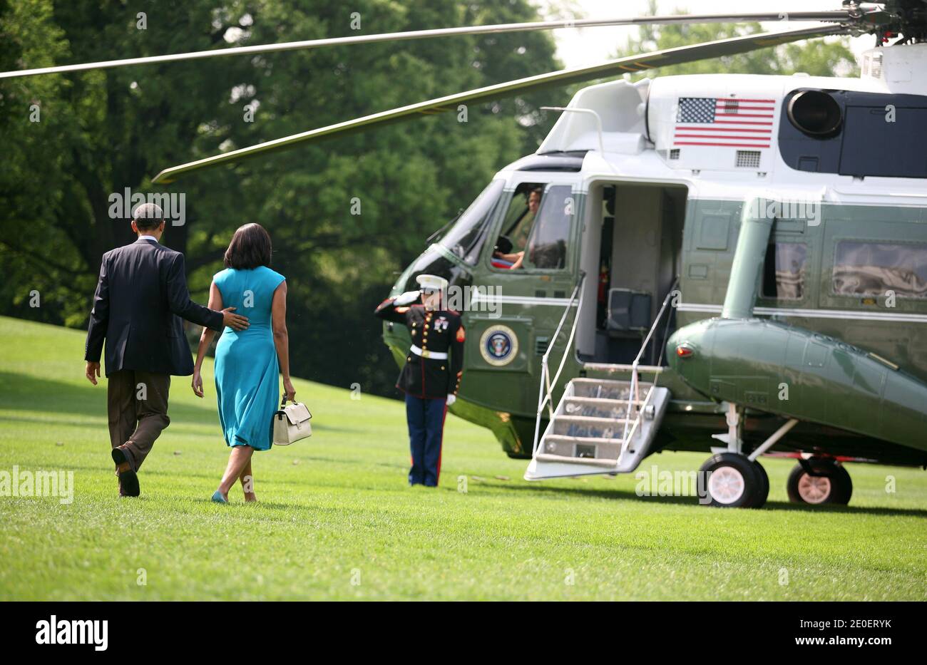 US President Barack Obama and wife, Michelle, depart the South Lawn of the White House for a day trip to Ohio and Virginia for the first official campaign rallies of the 2012 election season, in Washington, DC, USA, on May 05, 2012. Photo by Martin H. Simon/Pool/ABACAPRESS.COM Stock Photo