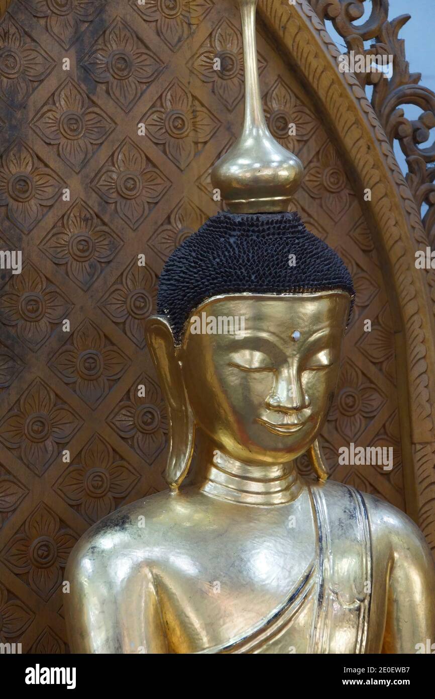Golden Buddha statue, Shwedagon Pagoda Yangon (Rangoon),  Myanmar (Burma) Stock Photo