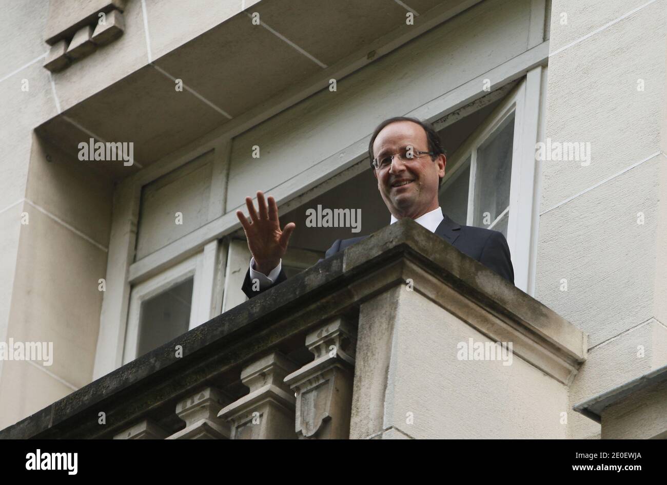 Newly elected president Francois Hollande waves from his balcony at his campaign headquarters in Paris, France on May 7, 2012 one day after the announcement of the first official results of the French presidential second round. Hollande was elected France's first Socialist president in nearly two decades on May 6, 2012. Photo by Mousse/ABACAPRESS.COM Stock Photo