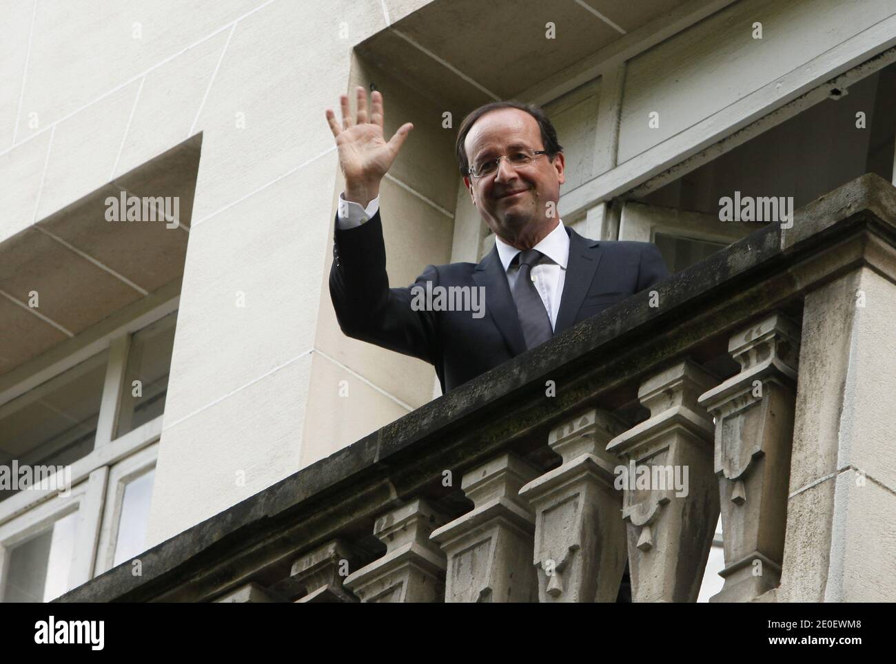 Newly elected president Francois Hollande waves from his balcony at his campaign headquarters in Paris, France on May 7, 2012 one day after the announcement of the first official results of the French presidential second round. Hollande was elected France's first Socialist president in nearly two decades on May 6, 2012. Photo by Mousse/ABACAPRESS.COM Stock Photo