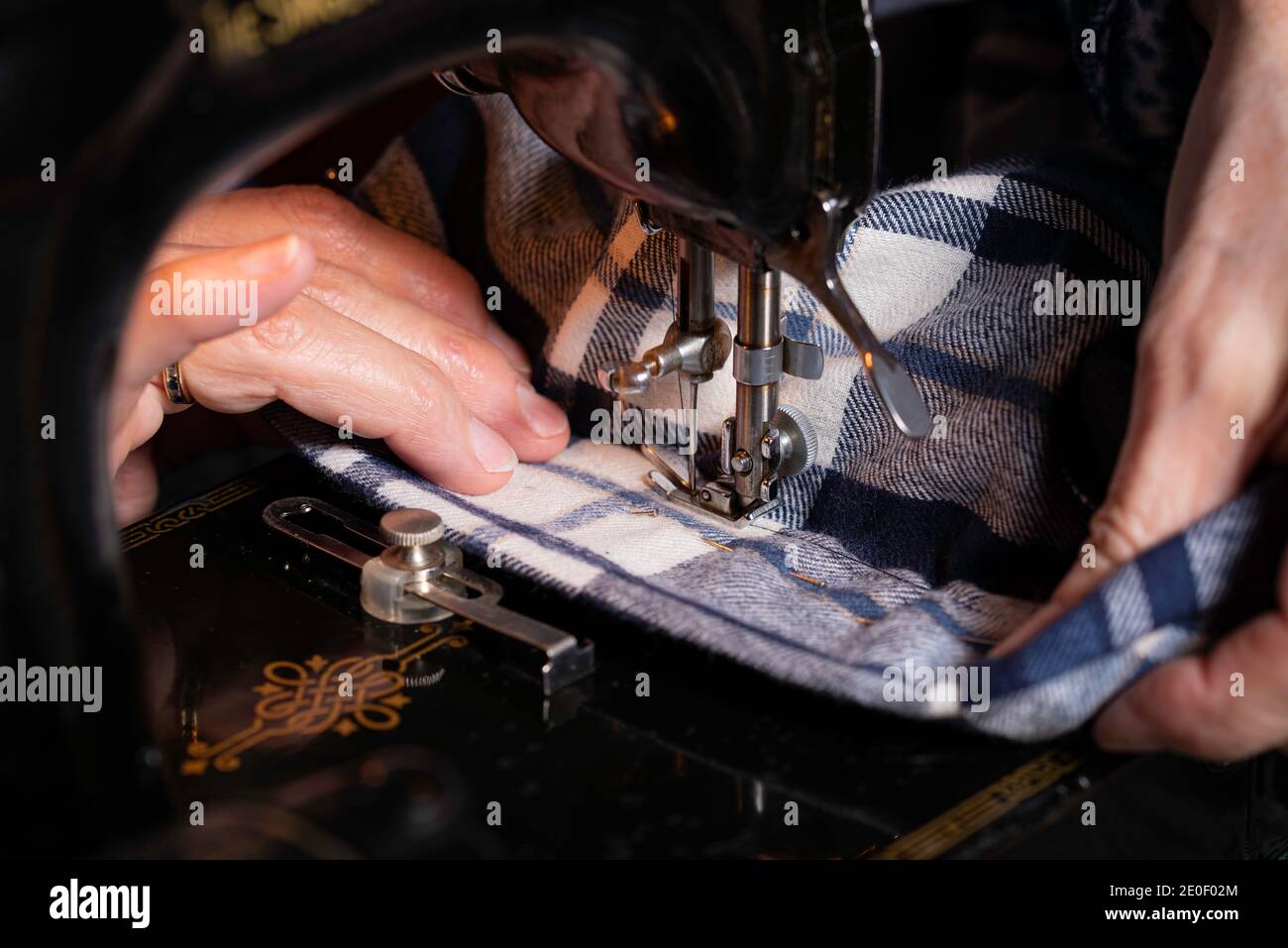 Sewing using old sewing machine Stock Photo Alamy