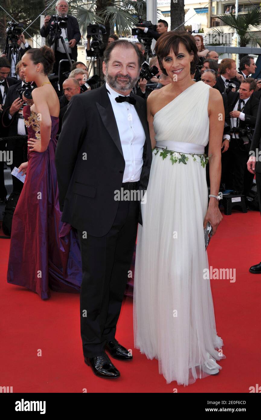 French model and designer Ines de la Fressange and her husband French Denis  Olivennes arriving at the Rust And Bone (De Rouille et D'Os) screening, as  part of the 65th Cannes International