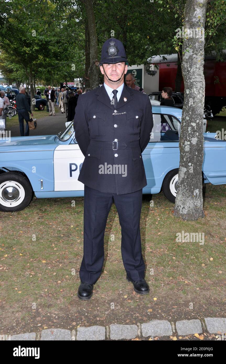 Male in vintage Police uniform costume at the Goodwood Revival, West Sussex, UK. Retro officer's outfit Stock Photo