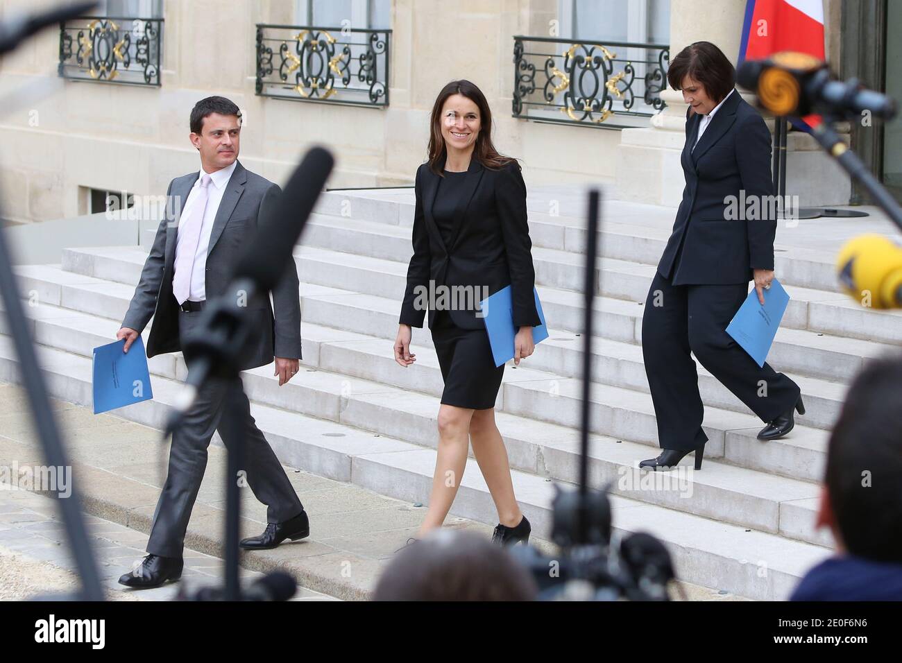 French Interior Minister Manuel Valls and French Minister for Culture and Communication Aurelie Filippetti and French Junior Minister for Disabled People, Marie-Arlette Carlotti leave the Elysee presidential palace in Paris, France on May 17, 2012 after the first weekly cabinet council of French president Francois Hollande's government. Photo by Stephane Lemouton/ABACAPRESS.COM. Stock Photo