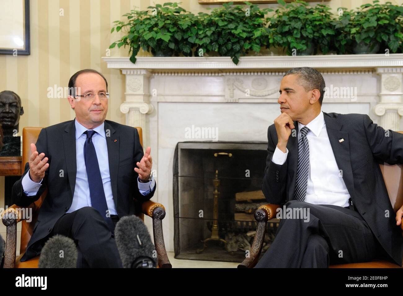 US President Barack Obama holds a bilateral meeting with French President Francois Hollande in advance of the G-8 and NATO Summits in the Oval Office of the White House in Washington, DC, USA on May 18, 2012. The two Presidents discussed their cooperation on a range of key topics, to include the global economy and Afghanistan. Photo by Jacques Witt/Pool/ABACAPRESS.COM Stock Photo