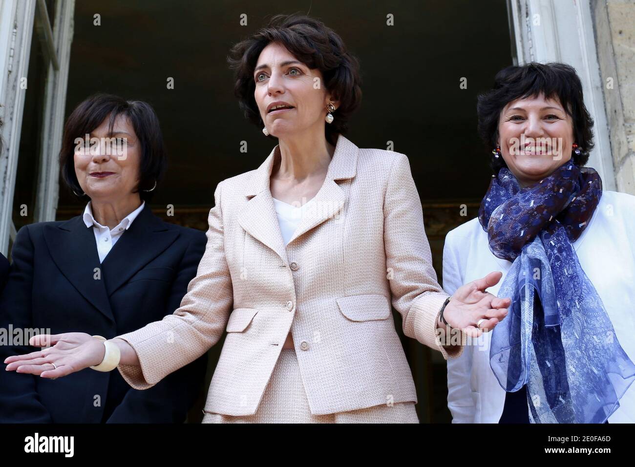 French newly appointed Social Affairs and Health Minister Marisol Touraine flanked Junior Minister for Disabled People Marie-Arlette Carlotti (L) and French Junior Minister for Family Dominique Bertinotti (R), addresses journalists upon her arrival at the Health Ministry in Paris to attend the official handover ceremony with her predecessor Xavier Bertrand, in Paris, France on May 17, 2012. Photo by Stephane Lemouton/ABACAPRESS.COM. Stock Photo