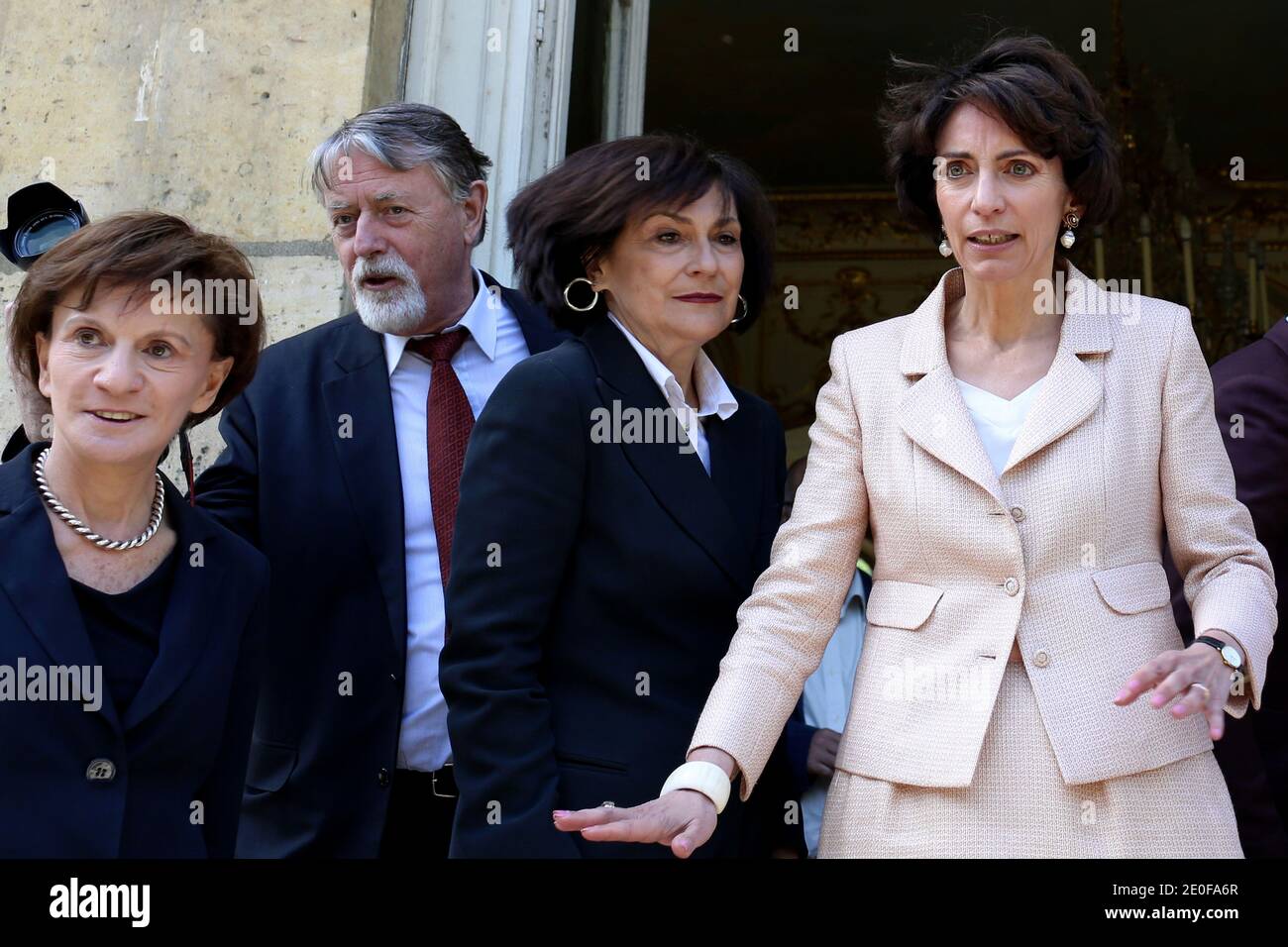 French newly appointed Social Affairs and Health Minister Marisol Touraine (R) flanked Junior Minister for Disabled People Marie-Arlette Carlotti (C) and newly appointed French Junior Minister for the Elderly and Disabled Michele Delaunay (L), addresses journalists upon her arrival at the Health Ministry in Paris to attend the official handover ceremony with her predecessor Xavier Bertrand, in Paris, France on May 17, 2012. Photo by Stephane Lemouton/ABACAPRESS.COM. Stock Photo