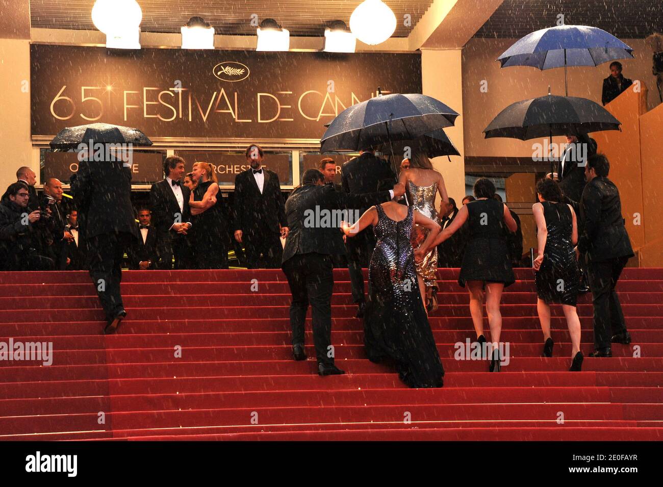 Atmosphere during the rainy premiere of 'Amour' presented in competiton at the 65th Cannes film festival, in Cannes, southern France, on May 20, 2012. Photo by Aurore Marechal/ABACAPRESS.COM Stock Photo