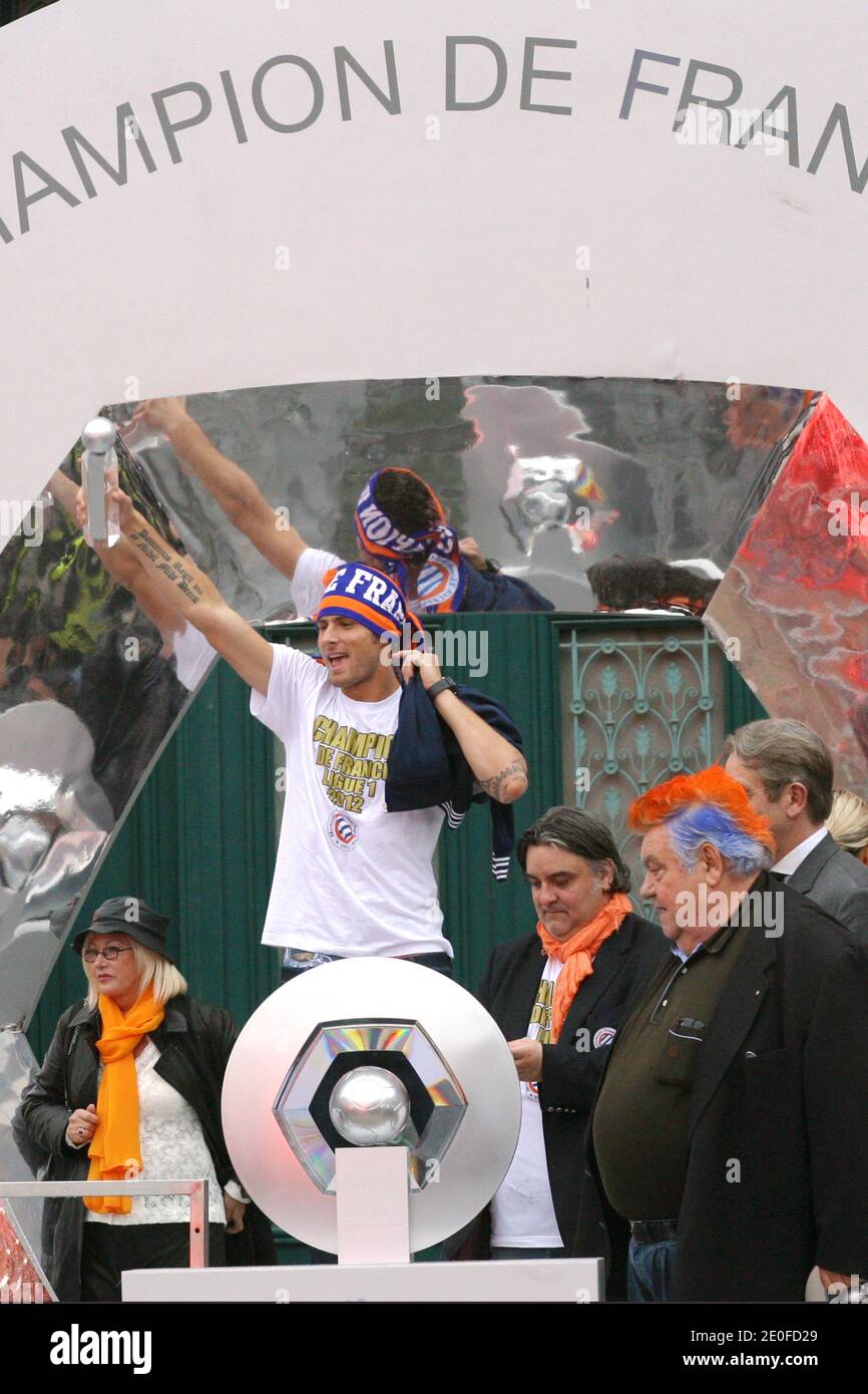 Montpellier HSC's soccer club president Louis Nicollin celebrates with his players after the club won on the eve the French First League football championship at the place de la Comedie in Montpellier, southern France on May 21, 2012. Montpellier finished the season three points clear of PSG in the final standings, which gave the southern club their first major honour since the 1990 French Cup. Photo by ABACAPRESS.COM Stock Photo
