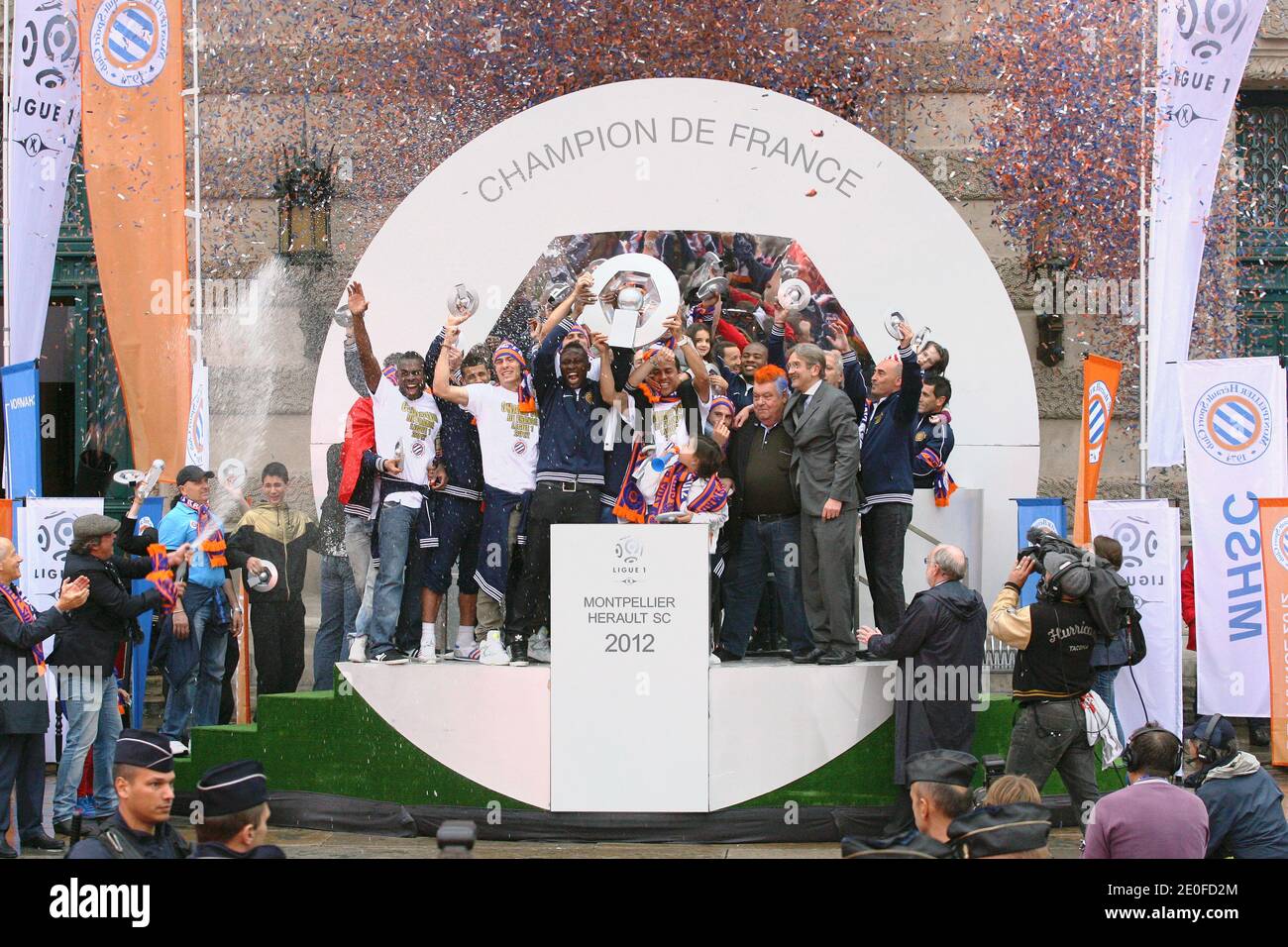 Montpellier HSC's soccer club president Louis Nicollin celebrates with his  players after the club won on the eve the French First League football  championship at the place de la Comedie in Montpellier,