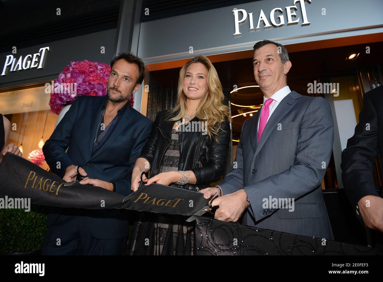 (L-R) Swiss rapper/actor Carlos Leal, Israeli supermodel Bar Refaeli and Piaget CEO Philippe Leopold-Metzger at the opening of Swiss jeweler Piaget's new flagship store in Geneva, Switzerland on May 10, 2012. Photo by Loona/ABACAPRESS.COM Stock Photo